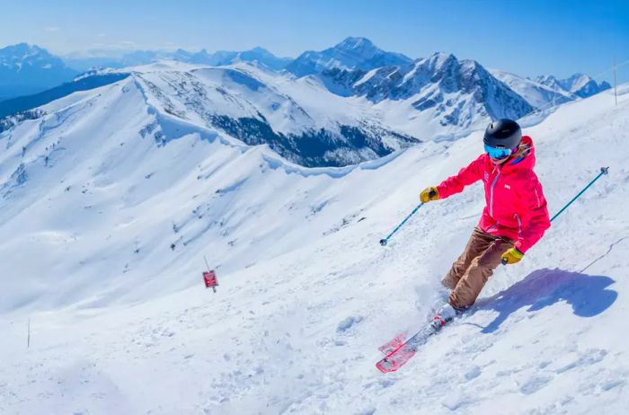 A skier enjoying the slopes at Marmot Basin