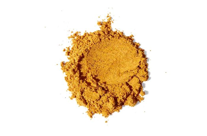 A collection of ras el hanout spice from Villa Jerada, photographed on a white background