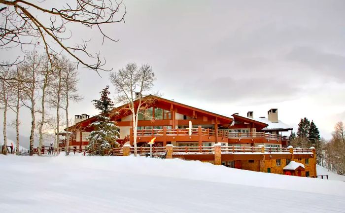 A picturesque view of Stein Eriksen Lodge blanketed in snow