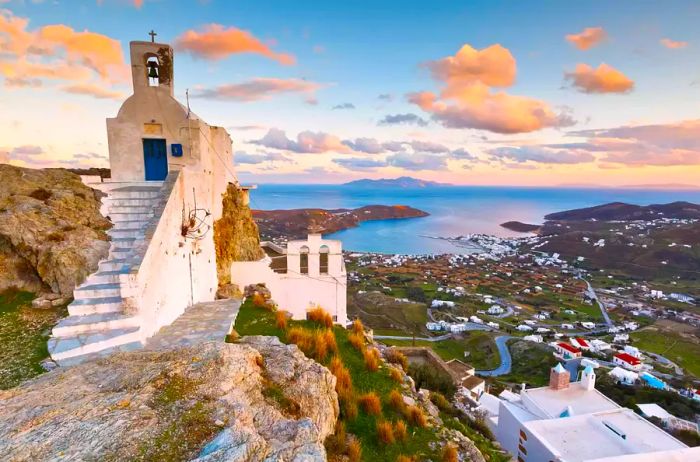 A glimpse of the harbor, Livadi village, with Sifnos island visible from Chora, Serifos island in Greece.