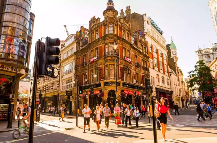 United Kingdom, England, London. West End, intersection on Shaftesbury Avenue.