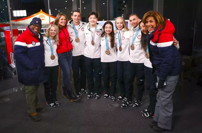 Al Roker, Hoda Kotb, and Savannah Guthrie with Team USA in 2018.