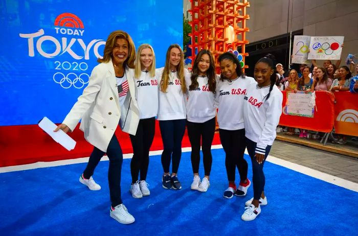 Hoda Kotb with Simone Biles, Suni Lee, Grace McCallum, Jordan Chiles, and Jade Carey.