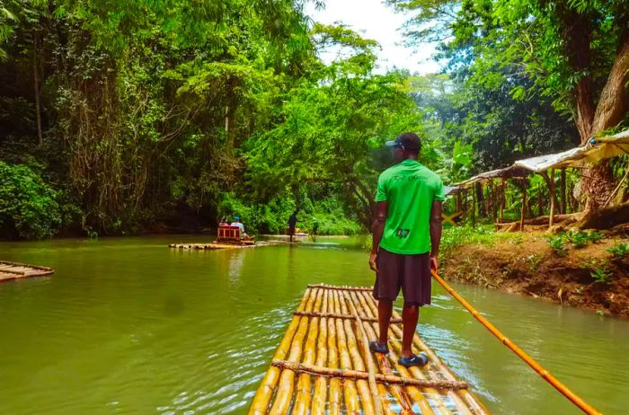 Bamboo rafting along a river in Jamaica