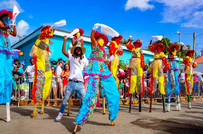 Carnival performers on stilts