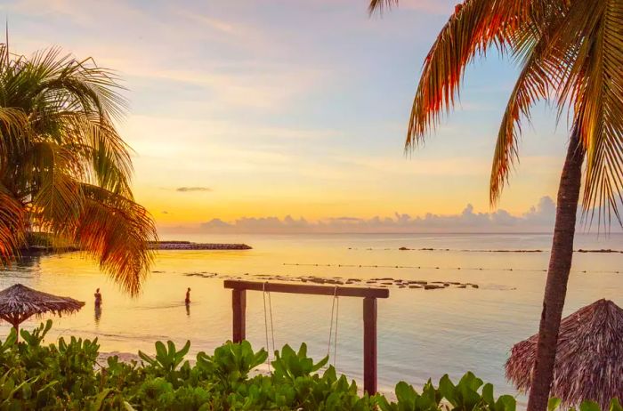 A stunning view of a Jamaica beach at sunset