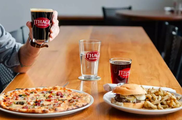 Delight in beer from Ithaca Beer Company paired with pizza and burgers