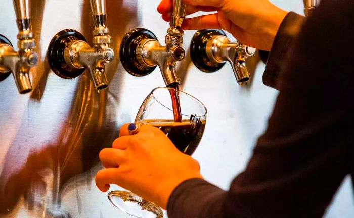 Pouring a refreshing beer at Rising Tide in Portland, ME