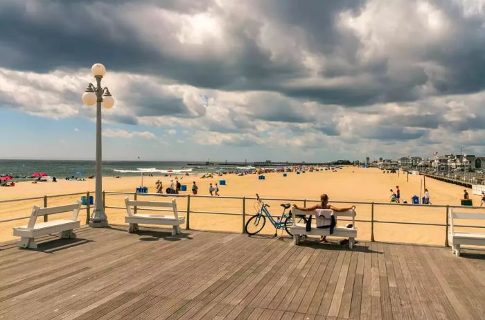 View of Ocean Grove Beach from the boardwalk on a cloudy day