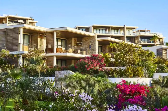 Exterior view showcasing the suites and gardens at Chileno Bay Resort & Residences, Auberge Resorts Collection