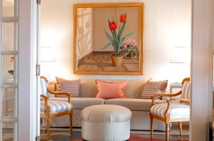 Artwork of tulips displayed above a sofa at The Wauwinet