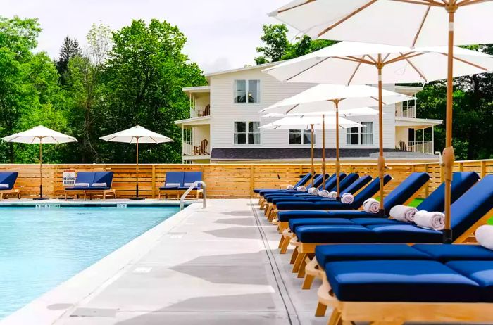 Charming lounge area with umbrellas beside the pool at Wylder Windham