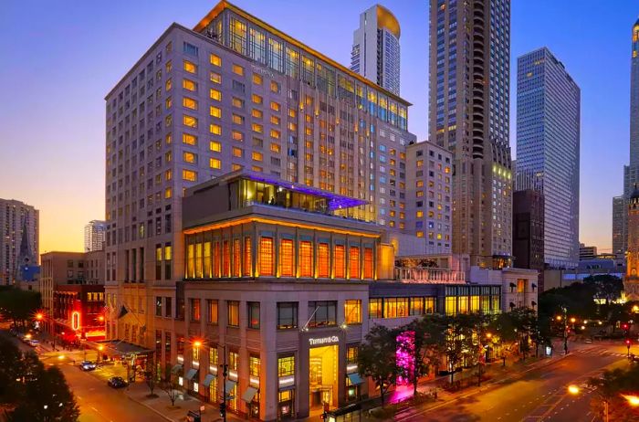 Nighttime exterior view of The Peninsula Chicago