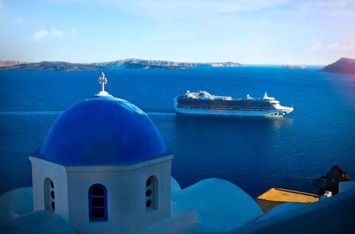 The Emerald Princess glides gracefully through the stunning landscapes of Santorini, Greece.