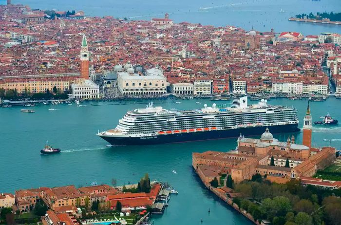 The MS Koningsdam glides through the enchanting canals of Venice.