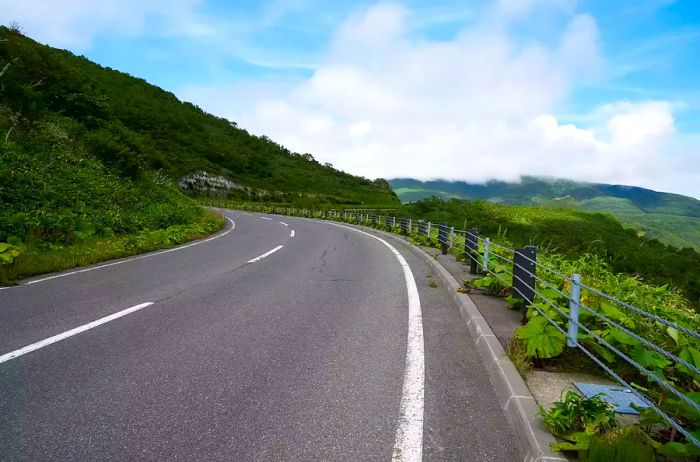 The route leading through Shiretoko Pass towards Utoro, located in Hokkaido, Japan.