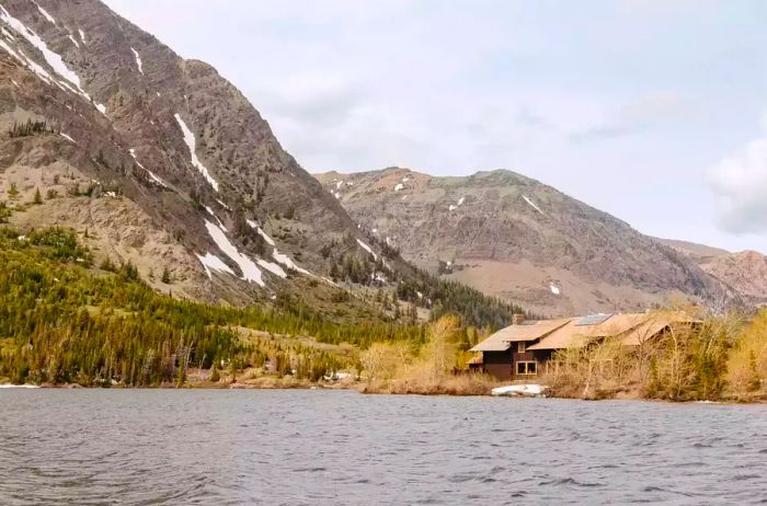 A picturesque view of the lake and mountains in Glacier National Park