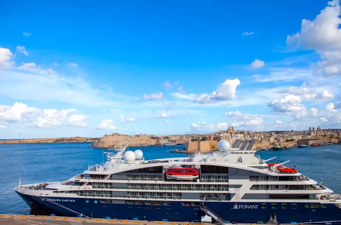 A Ponant ship docked in the picturesque harbor of Malta.