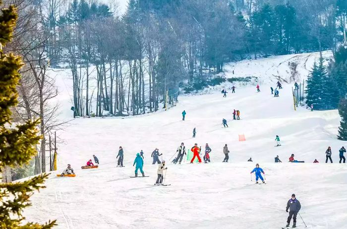 Skiers enjoying the slopes at Camelback Resort in Poconos, Pennsylvania