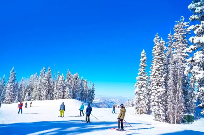 Skiers on Telluride Mountain.