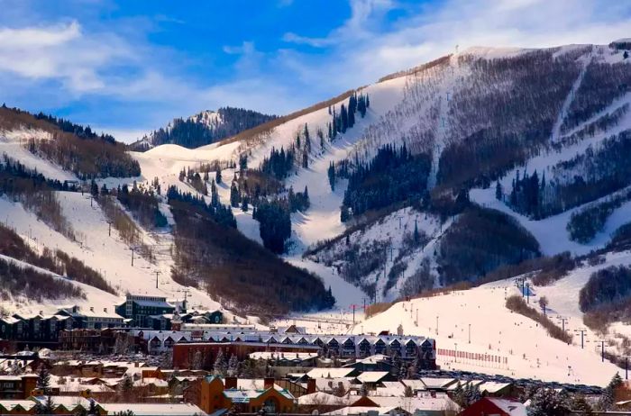 Park City Resort serves as a year-round recreational hub nestled in the Wasatch Mountains of northern Utah, featuring ski slopes, lodges, lifts, and hotels.