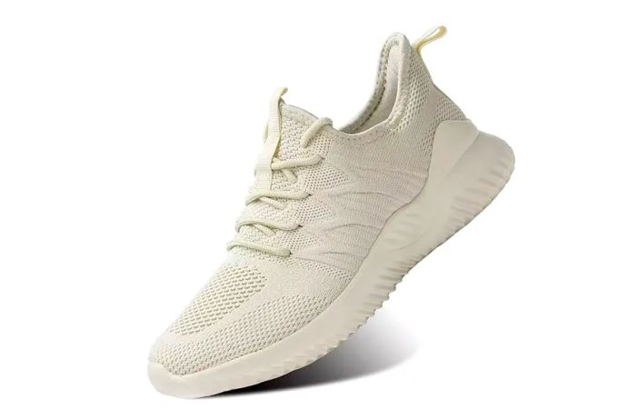 cream-colored walking and running sneakers