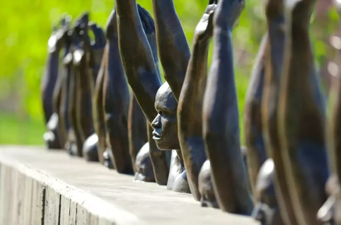 Statue depicting enslaved individuals by Hank Willis Thomas in Montgomery, AL