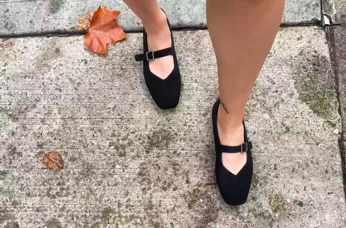 A person strolls outdoors wearing the VIVAIA Square-Toe Mary Jane (Margot Mary Jane)