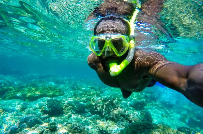 Mario Rigby snorkeling off the coast of Zanzibar