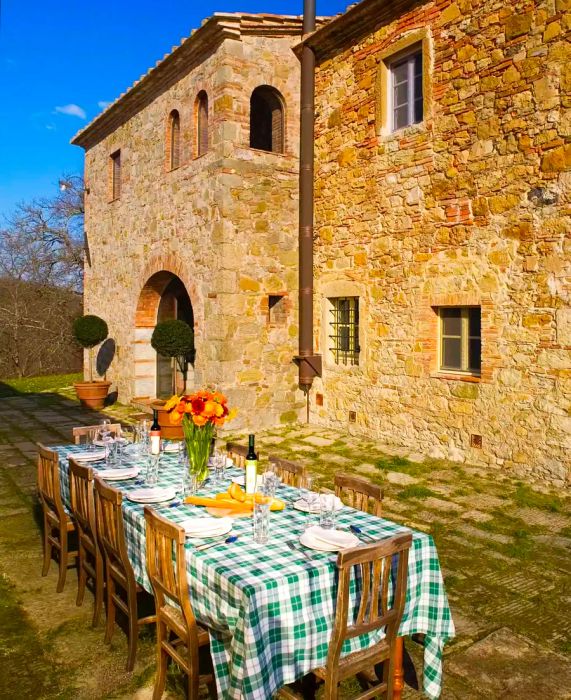 A beautifully arranged dinner table at a resort in Tuscany, Italy.