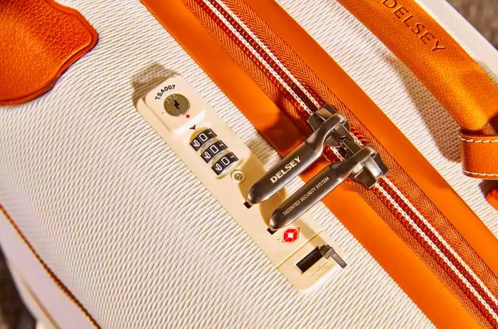 Close-up view of the lock on the Delsey Chatelet Air 2.0 21-inch Carry-on Spinner