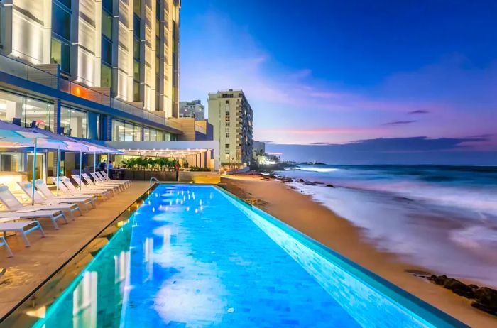 Dusk at the Infinity Pool of Condado Ocean Club in San Juan, Puerto Rico