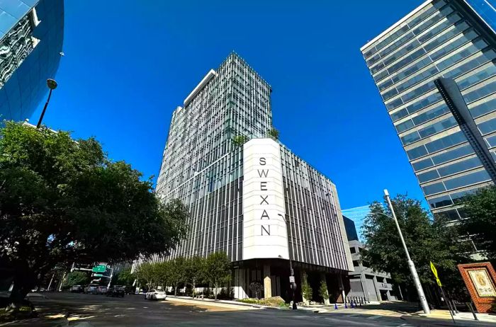 Daytime view of Hôtel Swexan’s exterior, designed by Kengo Kuma