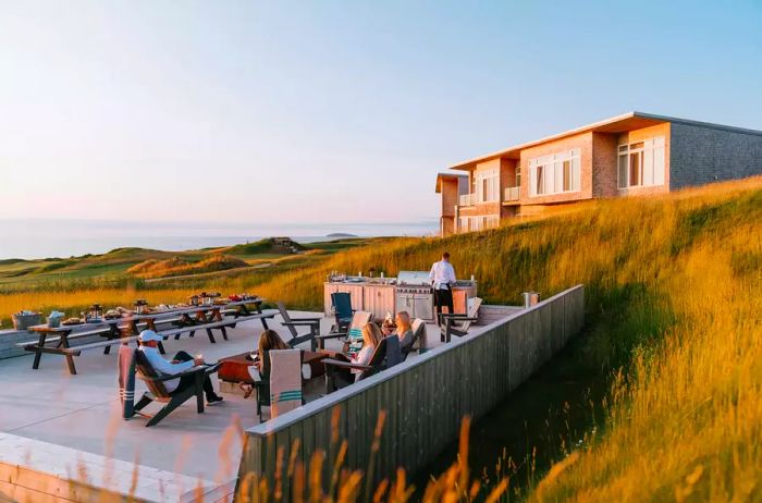 Outdoor dining terrace at Cabot Cape Breton