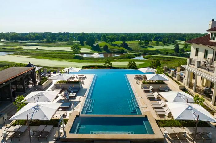 Aerial view of the pool area and lush surroundings