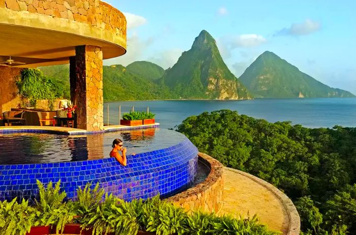 A woman enjoying a drink in an infinity pool