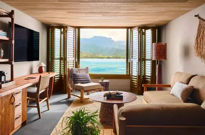 Living room of an interior suite with a view of Hanalei Bay.