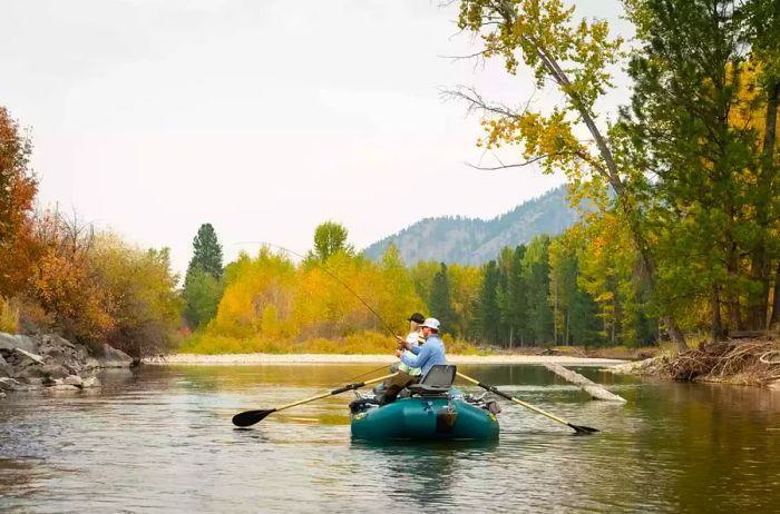 A couple enjoying canoeing and fishing