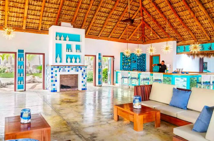 Lobby adorned with white and blue decor at Sanctuary Cap Cana