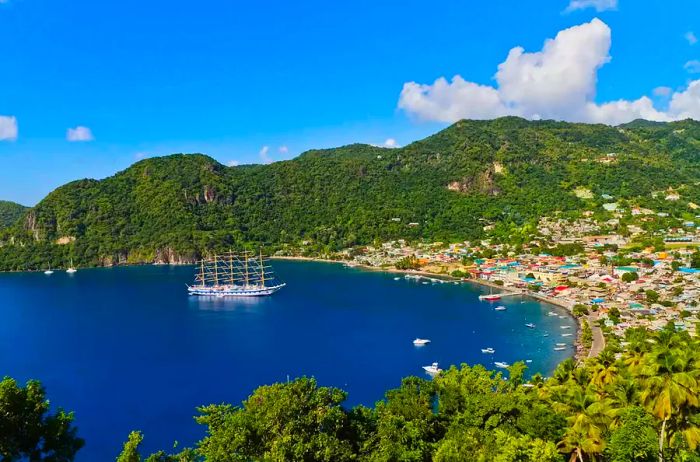 A sailing ship anchored in the picturesque Soufrière Bay, located on the southwest coast of Saint Lucia