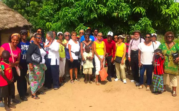 Gaynelle Henderson with a travel group during a tour.