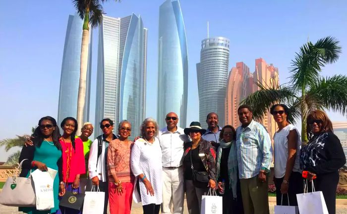 Gaynelle Henderson alongside a travel group during a tour.