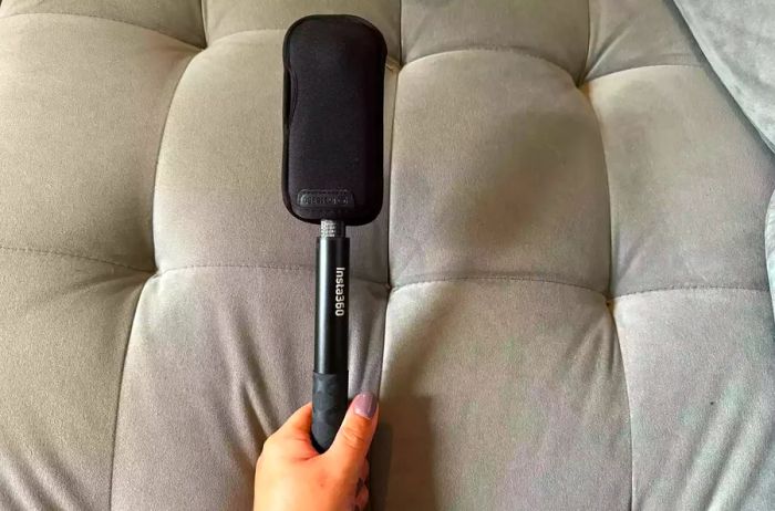 Insta360 x3 Selfie Stick on a sofa