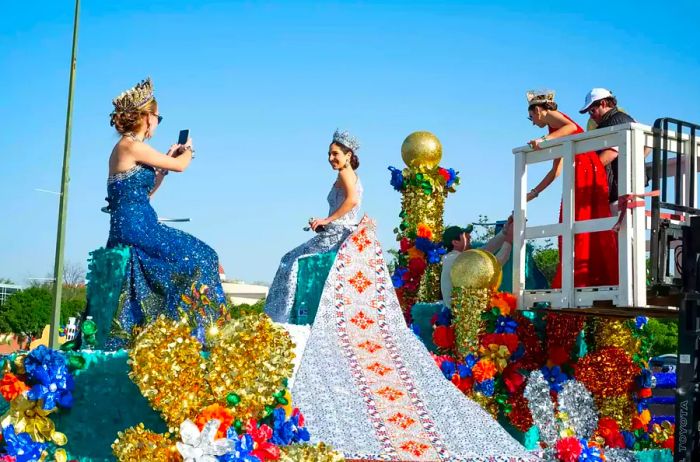 A float filled with duchesses gets ready for the parade to commence.