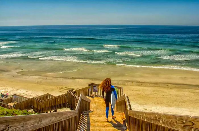 A female surfer enjoying the springtime outside San Diego.