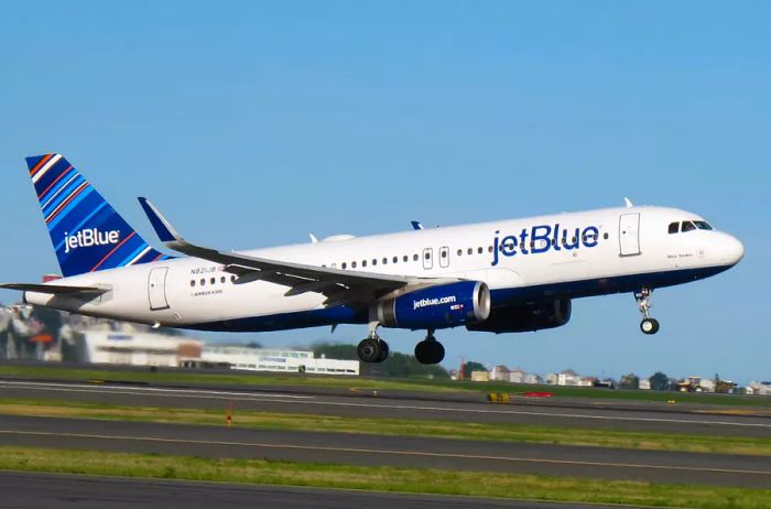 The exterior view of a JetBlue A320 aircraft