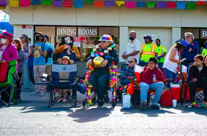 Onlookers gather to watch the parade kick off in San Antonio, Texas.