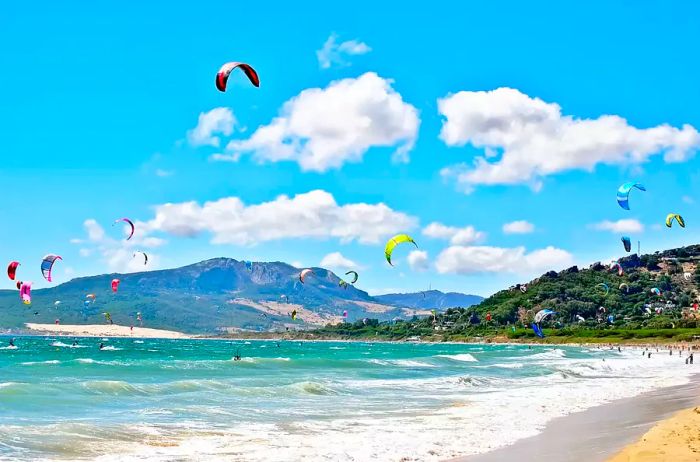 Kitesurfers enjoying the beach in Tarifa, Spain,