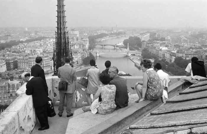 Visitors on the rooftop of Notre Dame, Paris, 1968