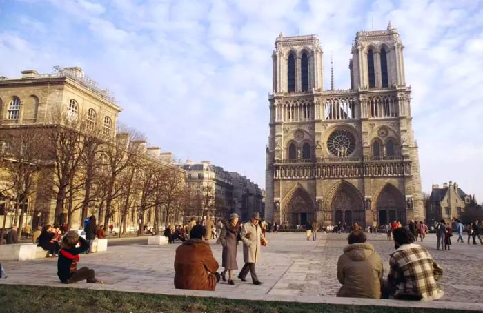 The plaza of Notre-Dame Cathedral around 1980 on the Île de la Cité in Paris, France